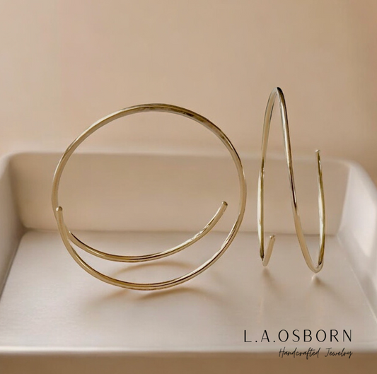 14k Gold Filled Delicate Threader Hoops in a tan jewelry tray 