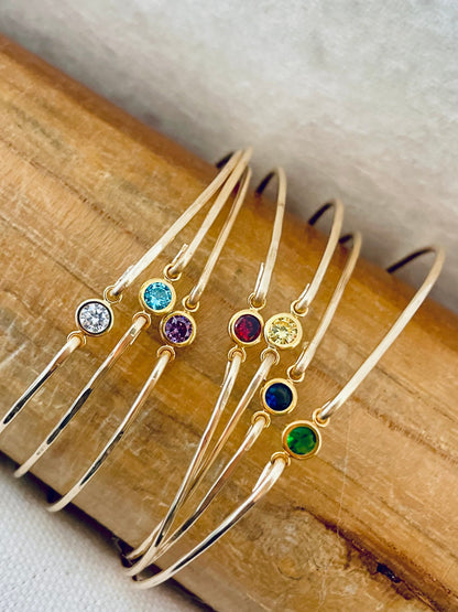 Birthstone bangle featuring sparkling CZ diamonds, makes a great gift for birthdays. 